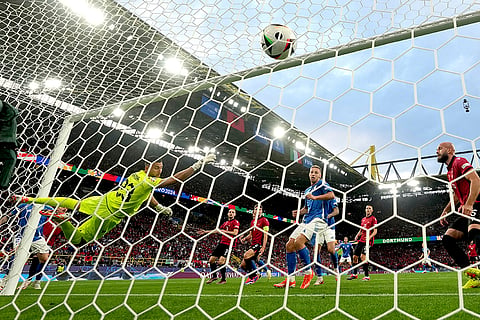 Alessandro Bastoni scores Italy's opening goal